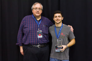 (left to right) Mark_Bagley_Instructory_of_Computer Science_Bruno_Miguel_Junior Bruno Miguel first place winner of the Game Design showcase in the college category