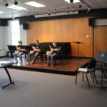 Middle school students participate in guitar fest